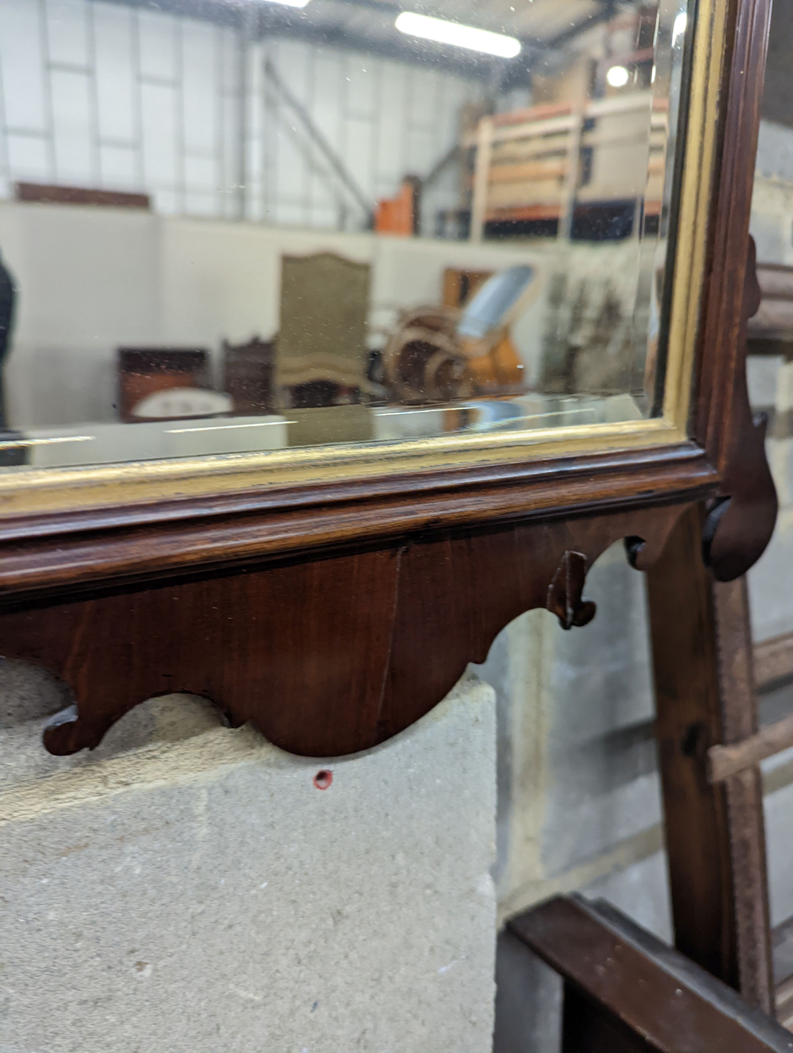 A George III mahogany fret frame wall mirror, height 63cm, width 39cm